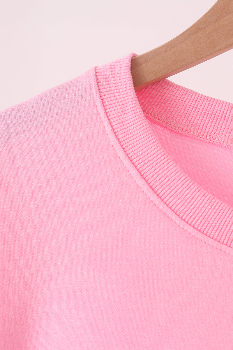 Pink football sequin mom&me top