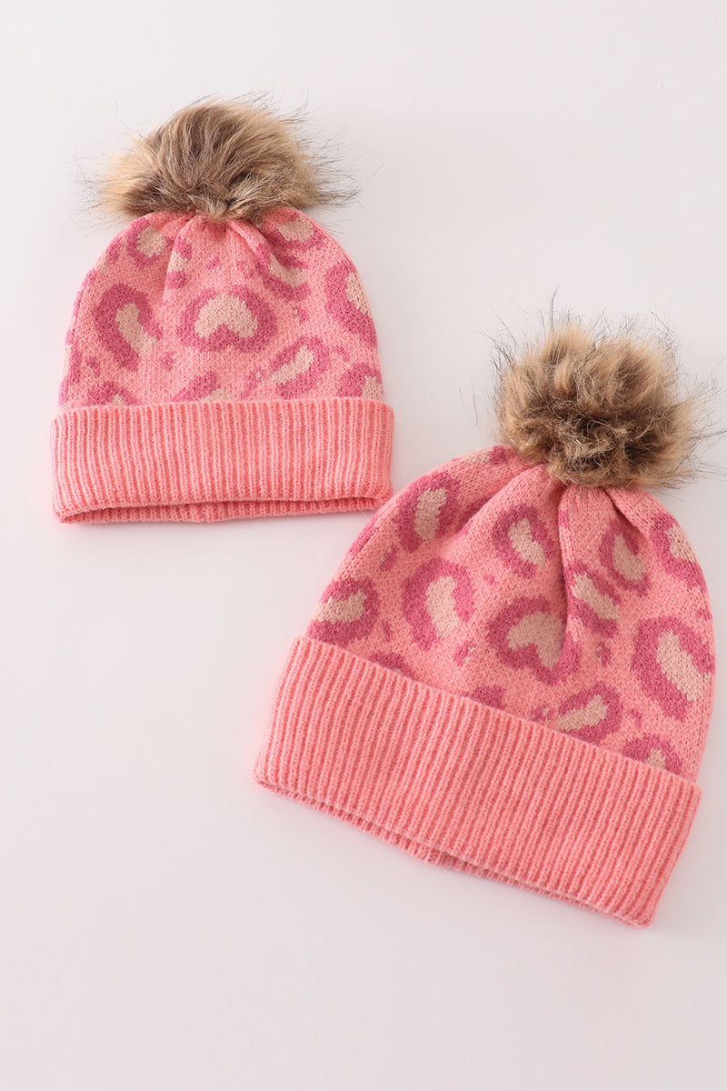 Pink pompom leopard cable beanie