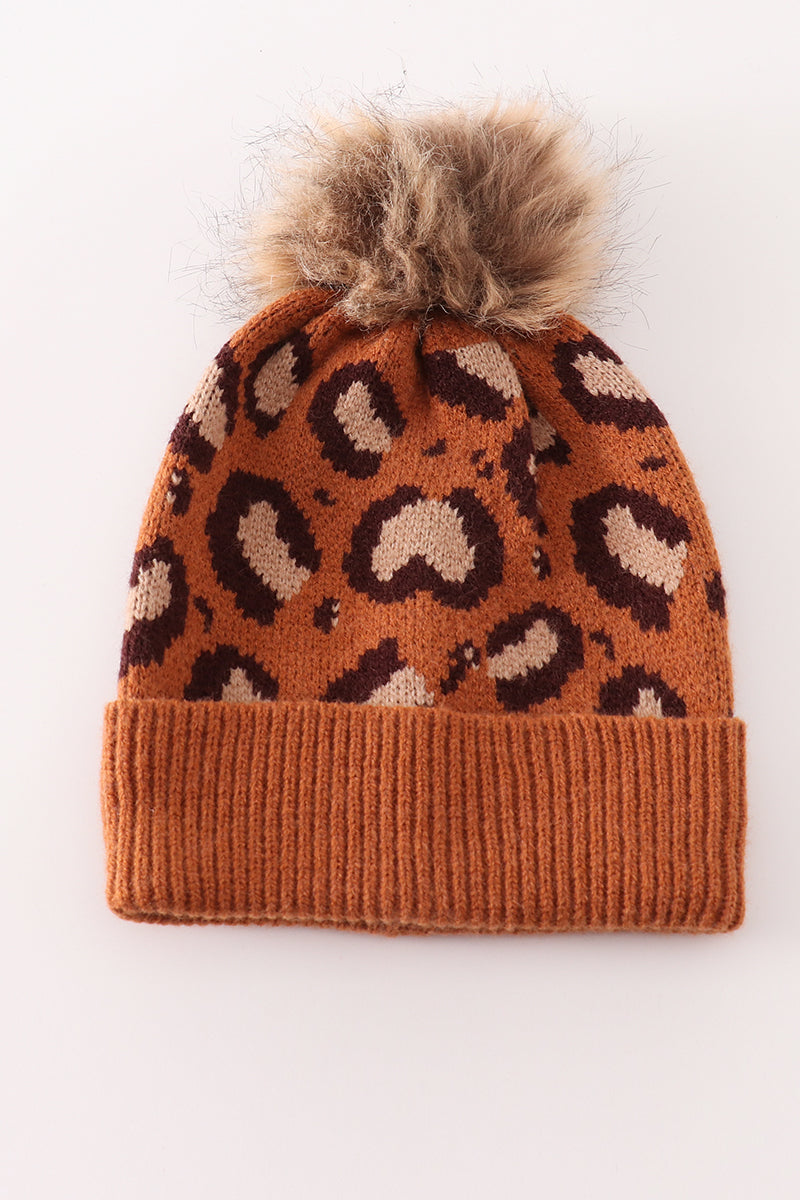 Brown pompom leopard cable beanie