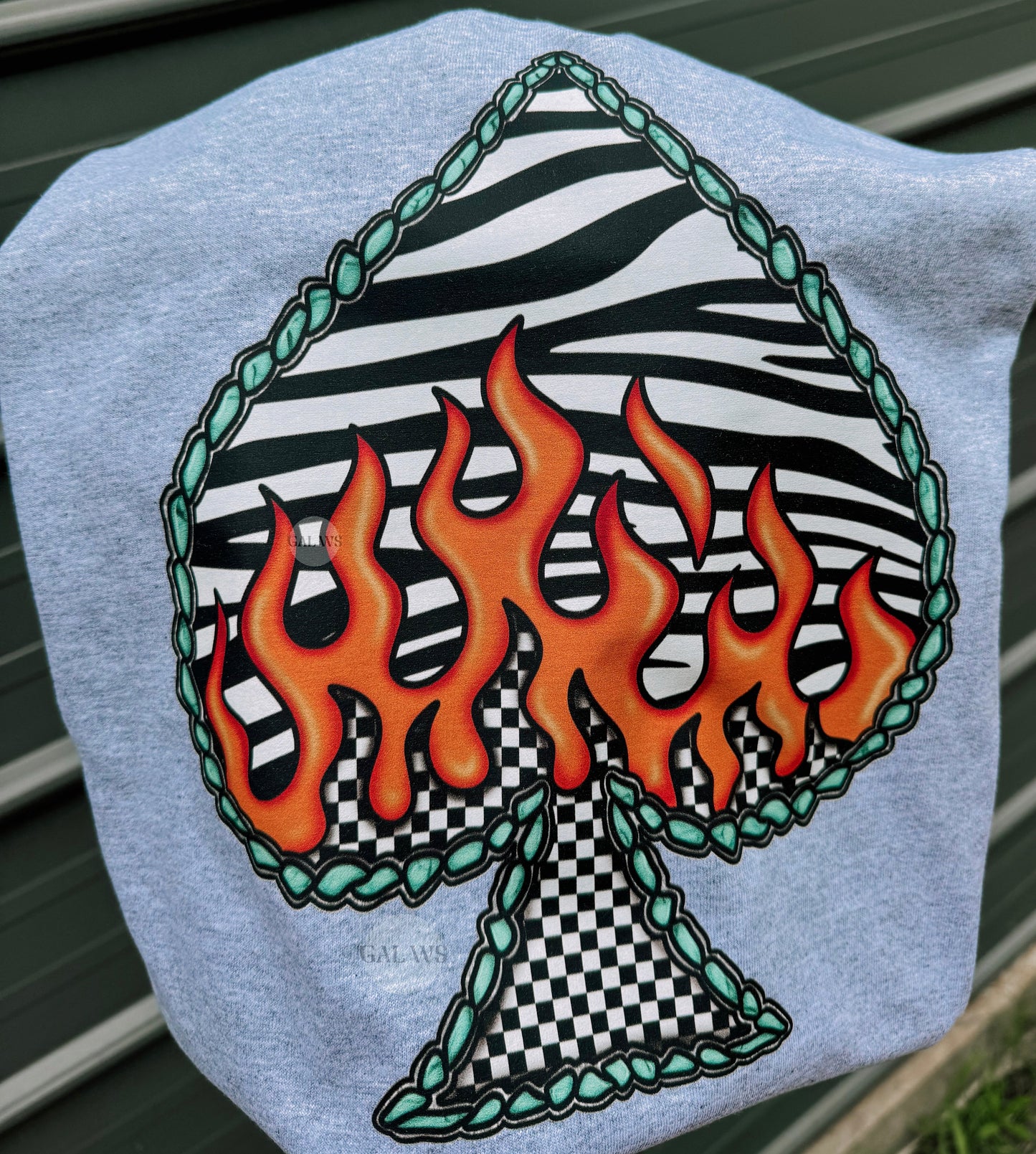 zebra flame spade with turquoisel tee or sweatshirt